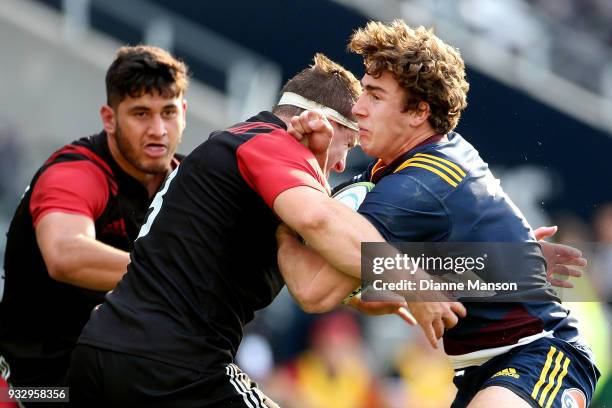 Josh McKay is tackled by Tom Sanders of the Crusaders Knights of the Highlanders Bravehearts during the match between Crusaders Knights and...
