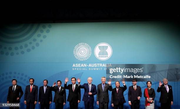 Australian Prime Minister Malcolm Turnbull poses for a formal welcome and family photo with , Laos' Prime Minister Thongloun Sisoulith, Indonesia's...