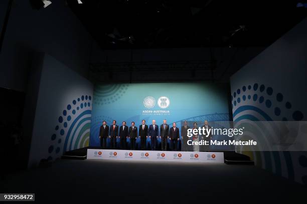 Australian Prime Minister Malcolm Turnbull poses for a formal welcome and family photo with , Laos' Prime Minister Thongloun Sisoulith, Indonesia's...