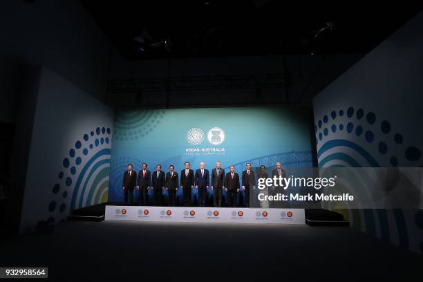 Australian Prime Minister Malcolm Turnbull poses for a formal welcome and family photo with , Laos' Prime Minister Thongloun Sisoulith, Indonesia's...