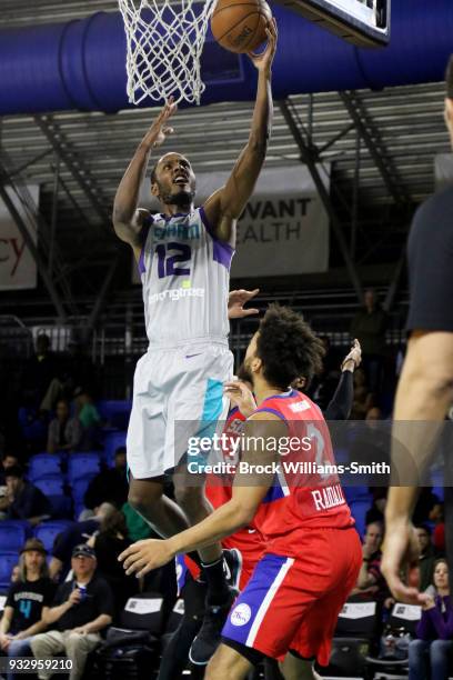 Sam Thompson of the Greensboro Swarm shoots the ball during the game against the Delaware 87ers on March 16, 2018 at Greensboro Coliseum in...