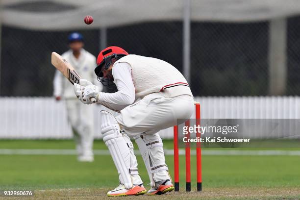 Andrew Ellis of Canterbury ducks under a bouncer during the Plunket Shield match between Canterbury and Auckland on March 17, 2018 in Rangiora, New...