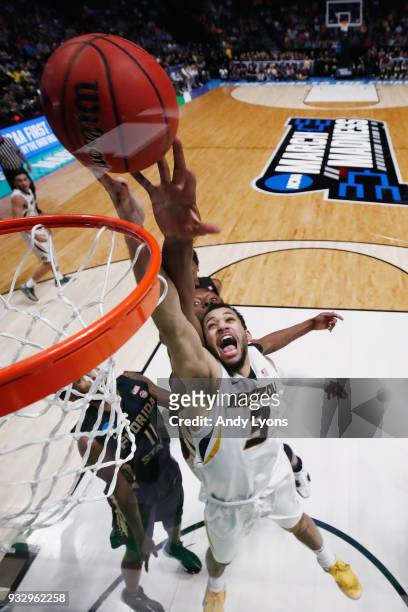 Kassius Robertson of the Missouri Tigers shoots in a layup against the Florida State Seminoles during the game in the first round of the 2018 NCAA...