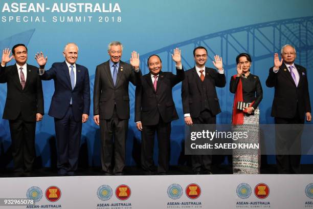 Australia's Prime Minister Malcolm Turnbull waves with ASEAN leaders Thailand's Prime Minister Prayuth Chan-O-Cha , Singapore's Prime Minister Lee...