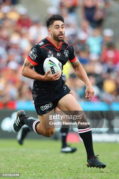Shaun Johnson of the Warriors makes a break during the round two NRL match between the New Zealand Warriors and the Gold Coast Titans at Mt Smart...