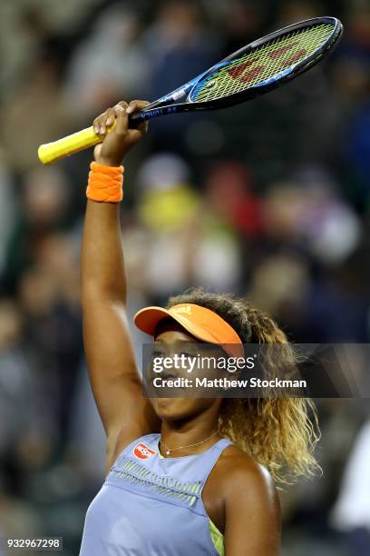 Naomi Osaka of Japan celebrates her win over Simona Halep of Romania during semifinals of the BNP Paribas Open at the Indian Wells Tennis Garden on...