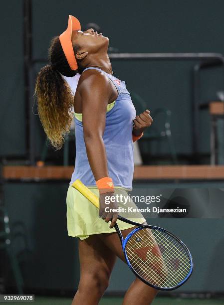 Naomi Osaka of Japan celebrates after defeating Simona Halep of Romania during their semifinals match during Day 12 of BNP Paribas Open on March 16,...