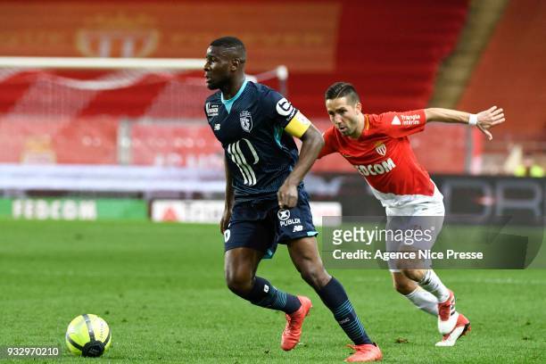 Ibrahim Amadou of Lllle and Joao Moutinho of Monaco during the Ligue 1 match between AS Monaco and Lille OSC at Stade Louis II on March 16, 2018 in...