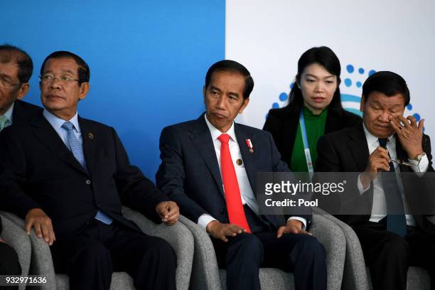Cambodian Prime Minister Hun Sen Indonesian President Joko Widodo and Laos Prime Minister Thongloun Sisoulith attend the New Colombo Plan Reception...