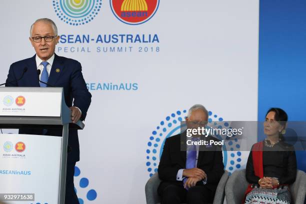 Australian Prime Minister Malcolm Turnbull delivers an address as Malaysian Prime Minister Najib Razak and Myanmar State Counsellor Aung San Suu Kyi...