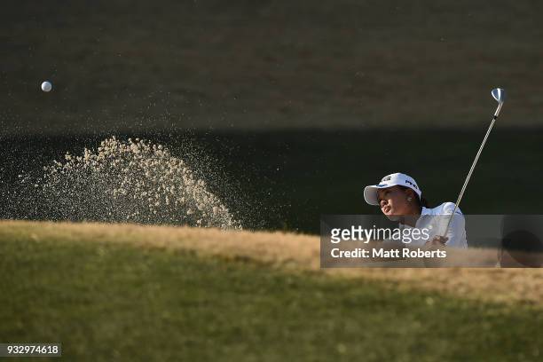 Ai Suzuki of Japan hits out of the 18th green bunker during the second round of the T-Point Ladies Golf Tournament at the Ibaraki Kokusai Golf Club...
