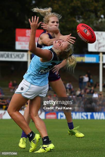 Dana Hooker of the Dockers and Sarah Hosking of the Blues contest for a mark during the round seven AFLW match between the Fremantle Dockers and the...