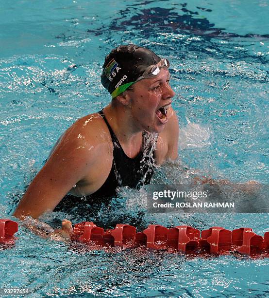 Kathryn Meaklim of South Africa celebrates after breaking the world record in the women's 400m individual medley during the Fina/Arena Swimming World...