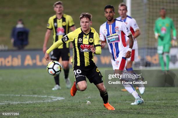 Michael McGlinchey of the Wellington Phoenix passes the ball during the round 23 A-League match between the Wellington Phoenix and the Newcastle Jets...