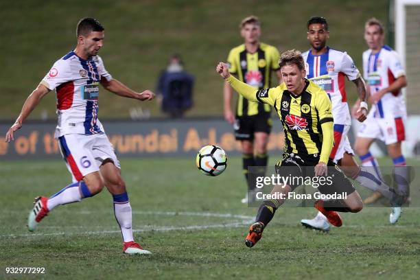 Michael McGlinchey of the Wellington Phoenix passes the ball during the round 23 A-League match between the Wellington Phoenix and the Newcastle Jets...