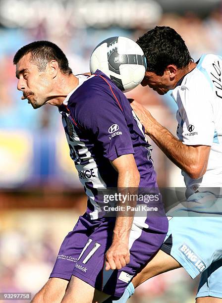 Branko Jelic of the Glory and Simon Colosimo of Sydney contest the ball during the round 15 A-League match between Perth Glory and Sydney FC at ME...