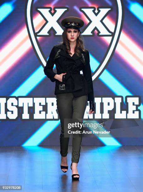 Model walks the runway wearing Mister Triple X at Los Angeles Fashion Week Powered by Art Hearts Fashion LAFW FW/18 10th Season Anniversary at The...
