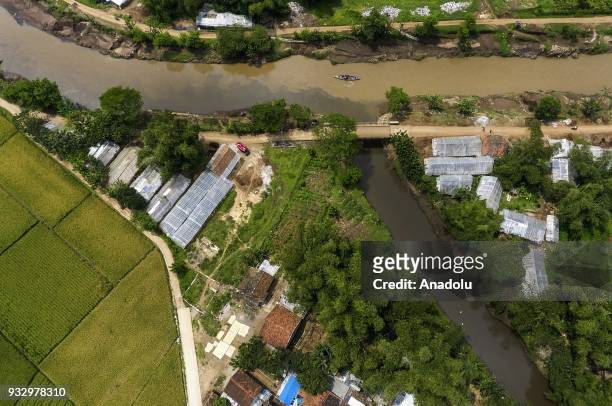 Contaminated Cipadaulun-Cirasea river is seen in Parigi, Ciparay, Bandung, West Java, Indonesia, on March 16, 2018. The black color of the Cirasea...