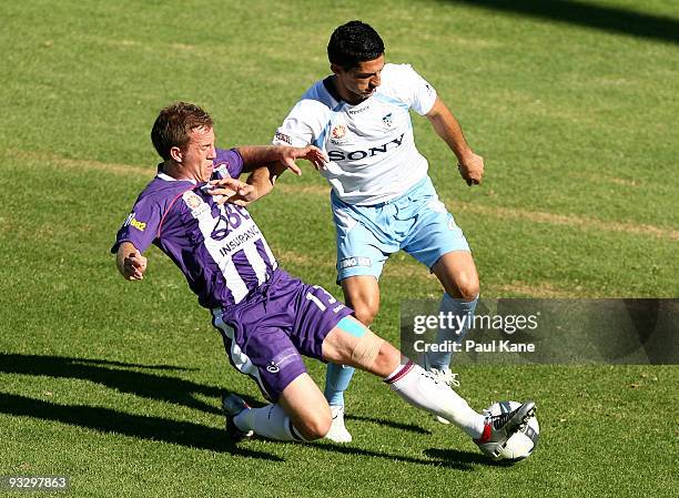 Scott Bulloch of the Glory and Simon Colosimo of Sydney contest the ball during the round 15 A-League match between Perth Glory and Sydney FC at ME...