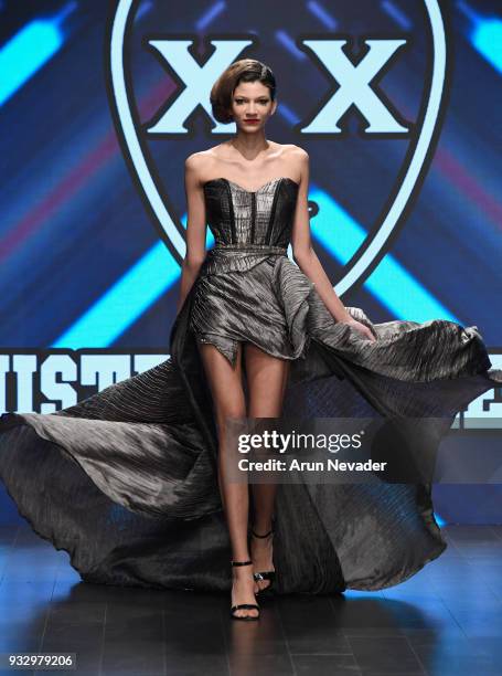 Model walks the runway wearing Mister Triple X at Los Angeles Fashion Week Powered by Art Hearts Fashion LAFW FW/18 10th Season Anniversary at The...