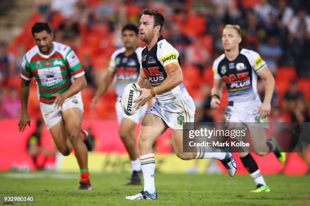 James Maloney of the Panthers runs the ball during the round two NRL match between the Penrith Panthers and the South Sydney Rabbitohs at Penrith...