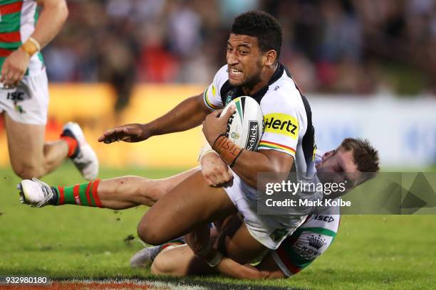 Viliame Kikau of the Panthers is tackled during the round two NRL match between the Penrith Panthers and the South Sydney Rabbitohs at Penrith...