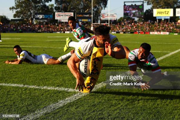 Josh Mansour of the Panthers is tackled into touch during the round two NRL match between the Penrith Panthers and the South Sydney Rabbitohs at...