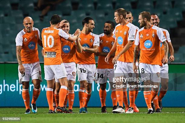 Matthew McKay of Brisbane celebrates scoring a goal with team mates during the round 23 A-League match between Sydney FC and the Brisbane Roar at...
