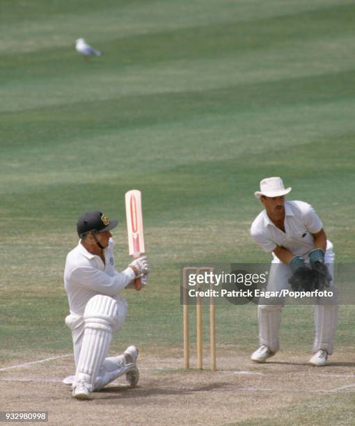 Geoff Marsh batting for Australia as England's wicketkeeper Bruce French looks on during the 4th Day of the Australia v England Bicentennial Test...