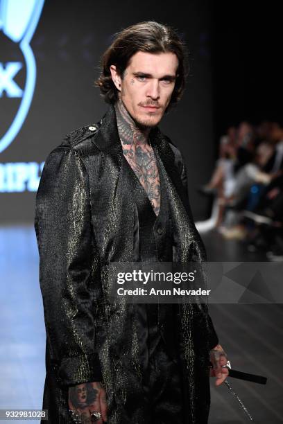 Model Jimmy Q walks the runway wearing Mister Triple X at Los Angeles Fashion Week Powered by Art Hearts Fashion LAFW FW/18 10th Season Anniversary...