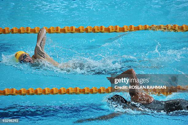 Australian Robert Hurley takes the lead followed by Tunisian Oussama Mellouli in the men's 15000m freestyle during the Fina/Arena Swimming World Cup...