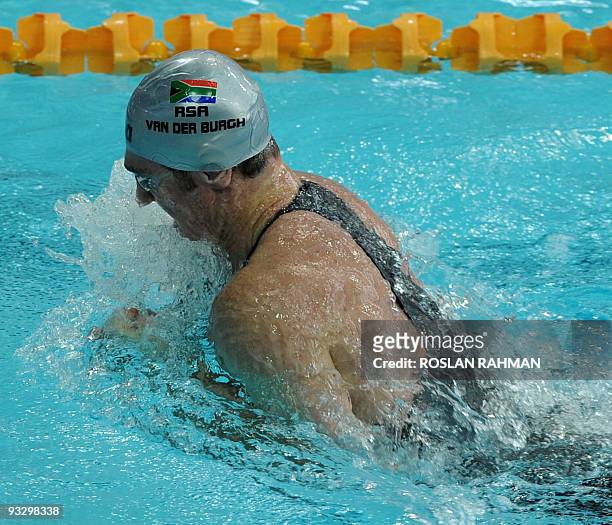 South African Cameron Van Der Burgh competes action in the men's 100m breaststroke during the Fina/Arena Swimming World Cup 2009 in Singapore on...