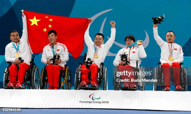 Wang Haitao, Chen Jianxin, Liu Wei, Wang Meng and Zhang Qiang celebrate the golden medal after the Curling Mixed Golden Medal match between China and...