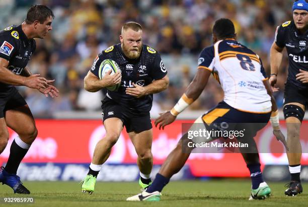 Akker van der Merwe of the Sharks runs the ball during the round five Super Rugby match between the Brumbies and the Sharks at GIO Stadium on March...