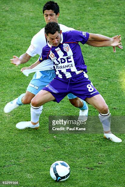 Victor Sikora of the Glory and Brendan Gan of Sydney contest the ball during the round 15 A-League match between Perth Glory and Sydney FC at ME Bank...