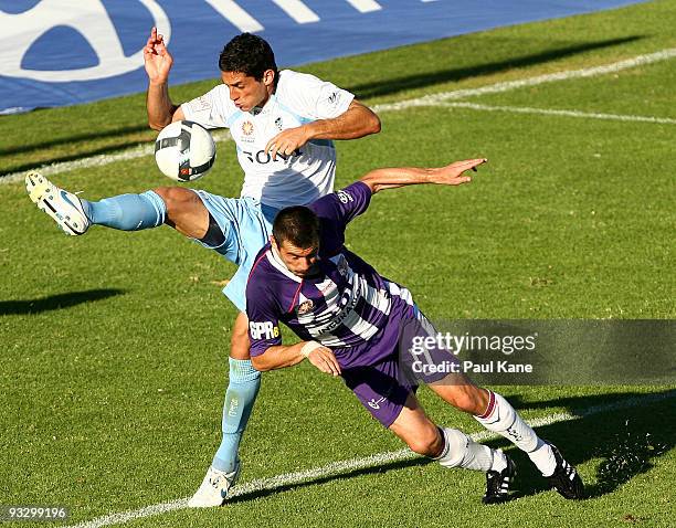 Simon Colosimo of Sydney and Branko Jelic of the Glory contest the ball during the round 15 A-League match between Perth Glory and Sydney FC at ME...