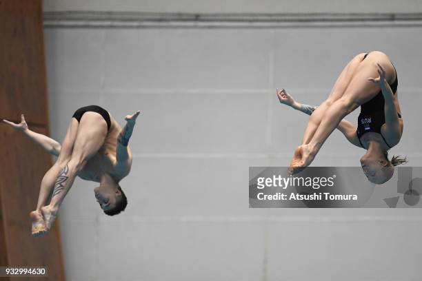 Nadezhda Bazhina and Nikita Shleikher of Russia compete in the Mixed 3m Synchro Springboard final during day three of the FINA Diving World Series...