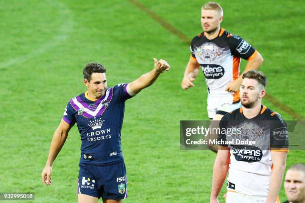 Billy Slater looks gestures to fans after losing in his 300th match during the round two NRL match between the Melbourne Storm and the Wests Tigers...