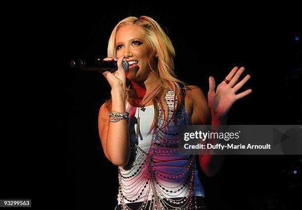 Singer Ashley Tisdale performs at Hot 92.3's The 8th Annual Christmas Tree Lighting Ceremony at the Citadel Outlets on November 21, 2009 in City of...