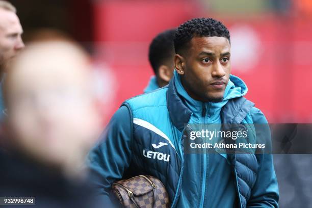 Luciano Narsingh of Swansea arrives at Liberty Stadium prior to kick off of the Fly Emirates FA Cup Quarter Final match between Swansea City and...