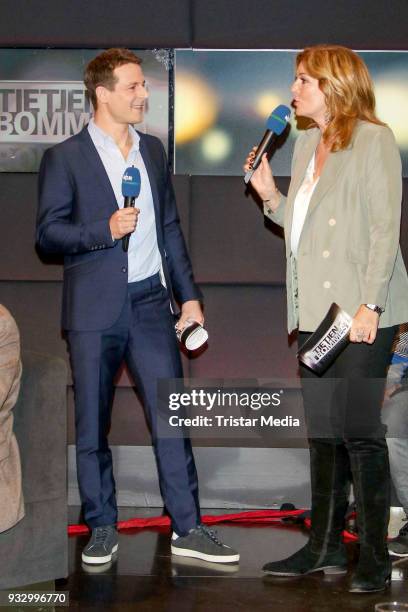 Alexander Bommes and Bettina Tietjen during the photo call to the 'Tietjen und Bommes' TV show on March 16, 2018 in Hanover, Germany.