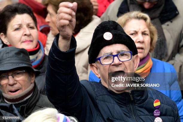 Demonstrator shouts slogans in Madrid on March 17 during a protest called by the main Spanish unions and the 'State Commitee to Safeguard Pensions' ,...