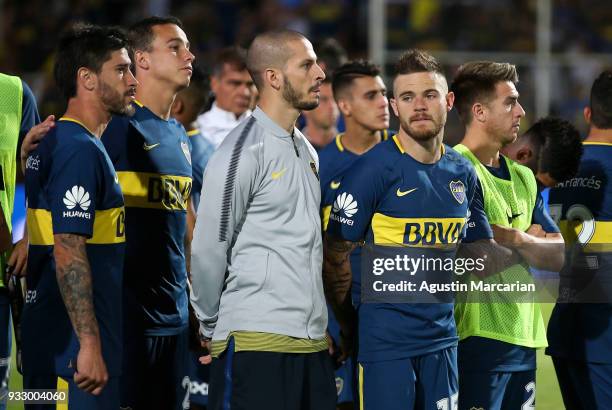 Pablo Perez, Leonardo Jara, Dario Benedetto and Nahitan Nandez of Boca Juniors react after losing the Supercopa Argentina 2018 against River Plate at...