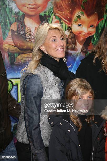 Marie Sara and her daughter attend the "Arthur and the Revenge of Maltazard" Paris premiere at Cinema Gaumont Marignan on November 22, 2009 in Paris,...