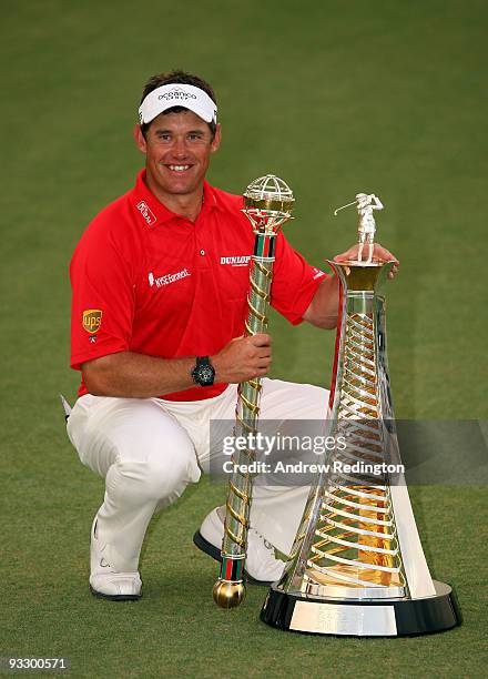 Lee Westwood of England poses with the trophy after winning the Dubai World Championship and the Race To Dubai on the Earth Course, Jumeirah Golf...