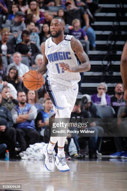 Jonathon Simmons of the Orlando Magic brings the ball up the court against the Sacramento Kings on March 9, 2018 at Golden 1 Center in Sacramento,...