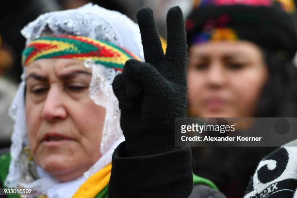 Expatriate Kurds show solidarity with Kurds in the town of Afrin, Syria, as they participate in celebrations marking the Kurdish new year, or Newroz,...