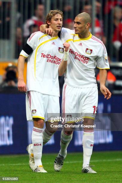 Stefan Kiessling of Leverkusen celebrates his first goal with Eren Derdiyok of Leverkusen during the Bundesliga match between Bayern Muenchen and...