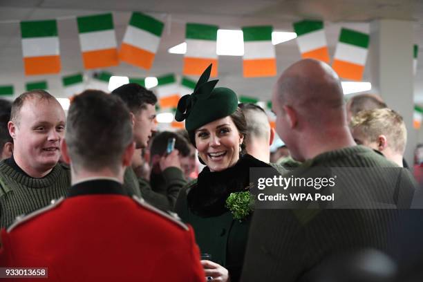 Catherine, Duchess of Cambridge during a visit to the 1st Battalion Irish Guardsmen for the annual Irish Guards St Patrick's Day Parade at Cavalry...