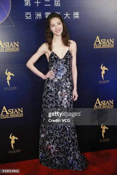 Actress Elane Zhong poses on the red carpet of the 12th Asian Film Awards at the Venetian Hotel on March 17, 2018 in Macao, China.